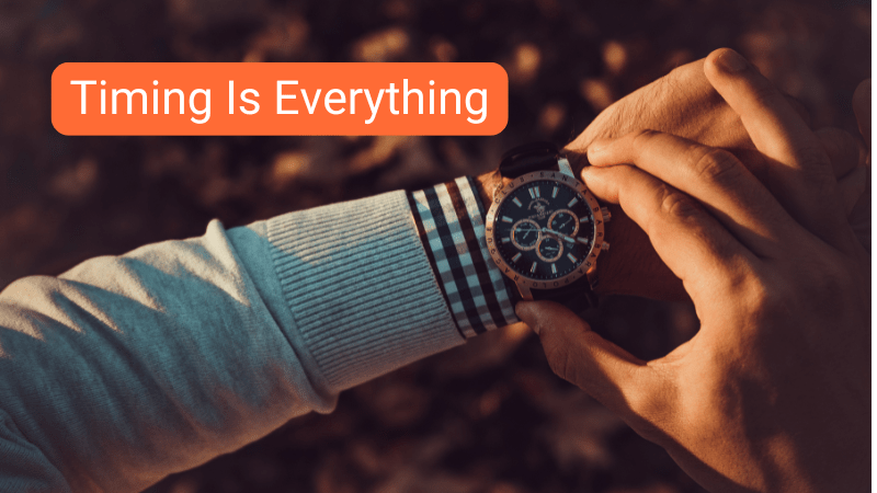 Man looking at a watch on his wrist 