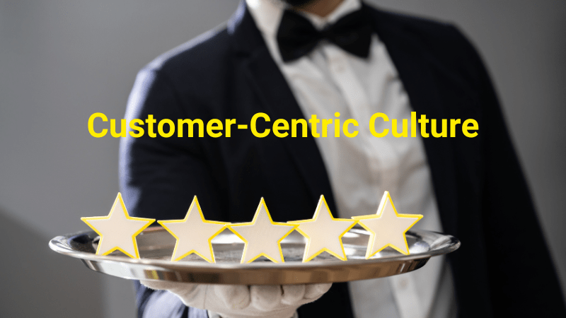 Customer-centric culture Man holding a 5 star platter - customer-centric culture